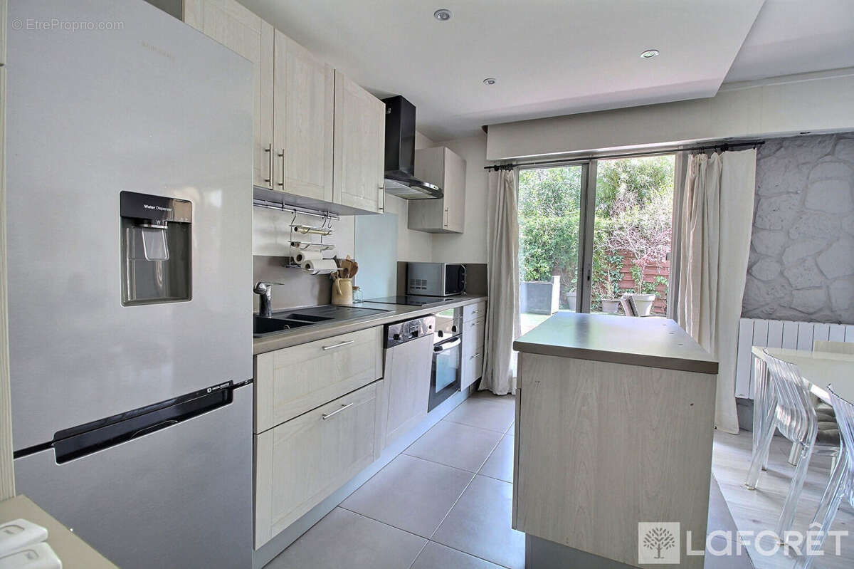 Appartement La Garenne Colombes 3 pièce(s) 67.5 m2 - photo 9