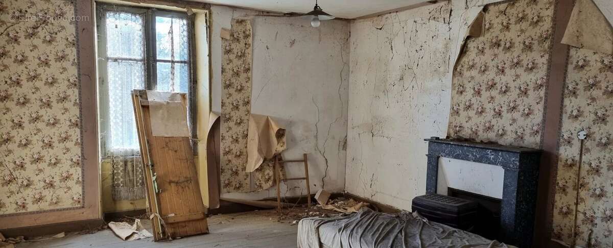 Maison de village à rénover avec ancien magasin - photo 11