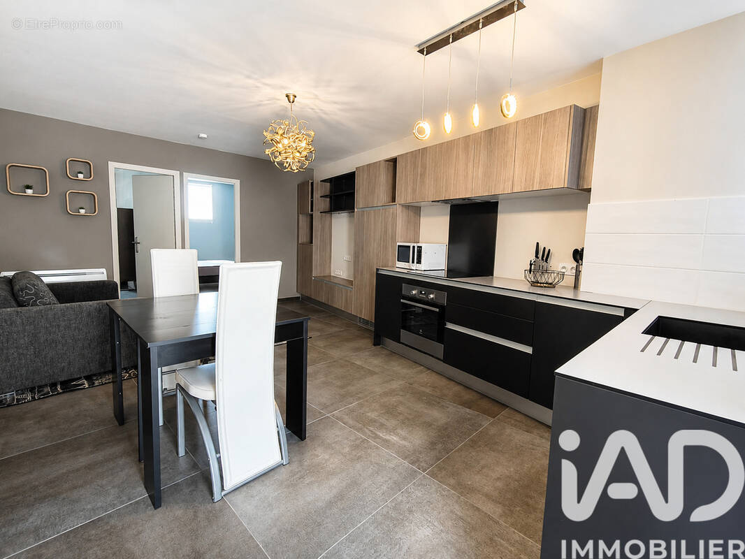Photo 1 - Appartement à LA TOUR-DE-SALVAGNY
