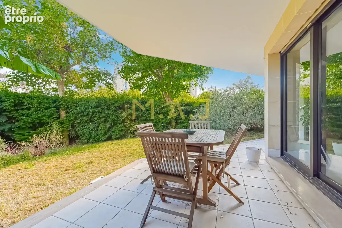 Appartement rez de jardin - photo 10