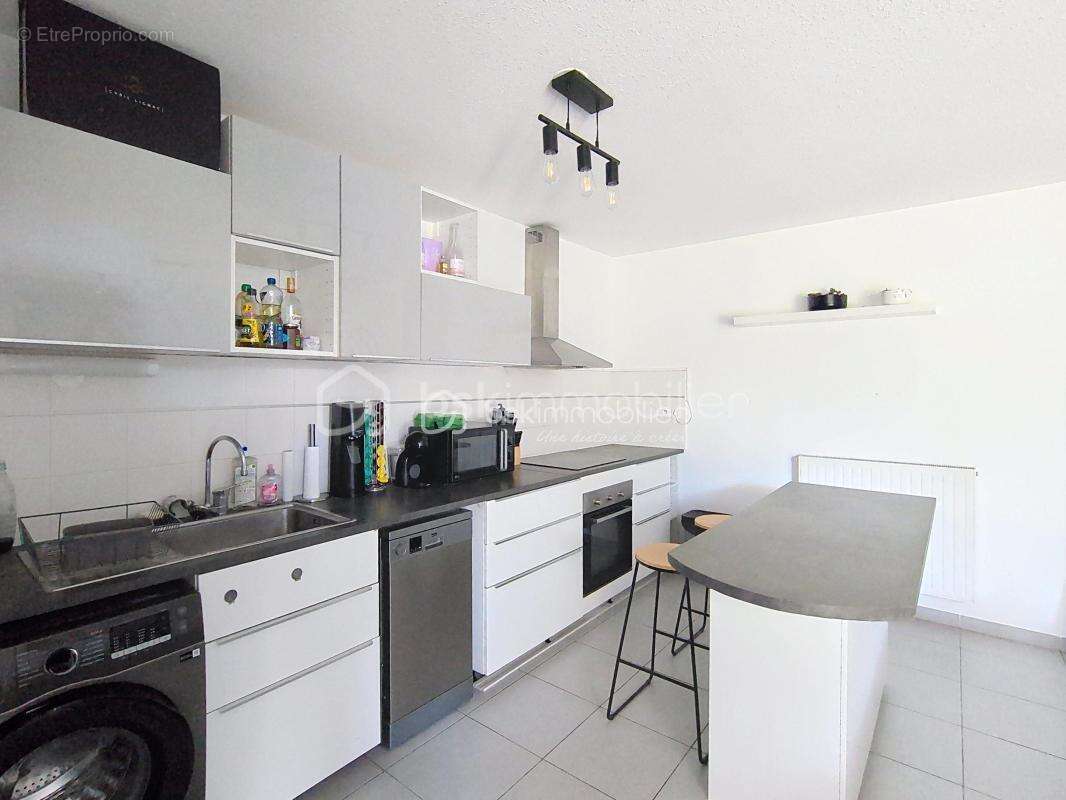 Beau T2 avec terrasse et garage - photo 4