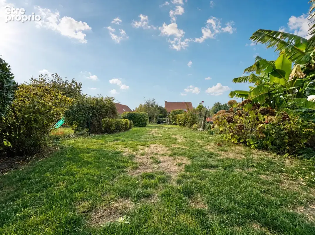 Maison aux beaux volumes avec jardin et stationnement privatif ! - photo 8