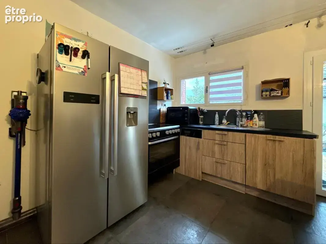 Maison à rénover avec 3 chambres, terrasse, jardin et sous-sol complet - photo 5