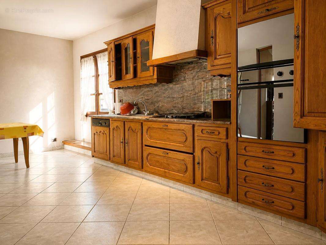 Maison plain-pied de 6 pièces de 185 m² à Eaunes - photo 4