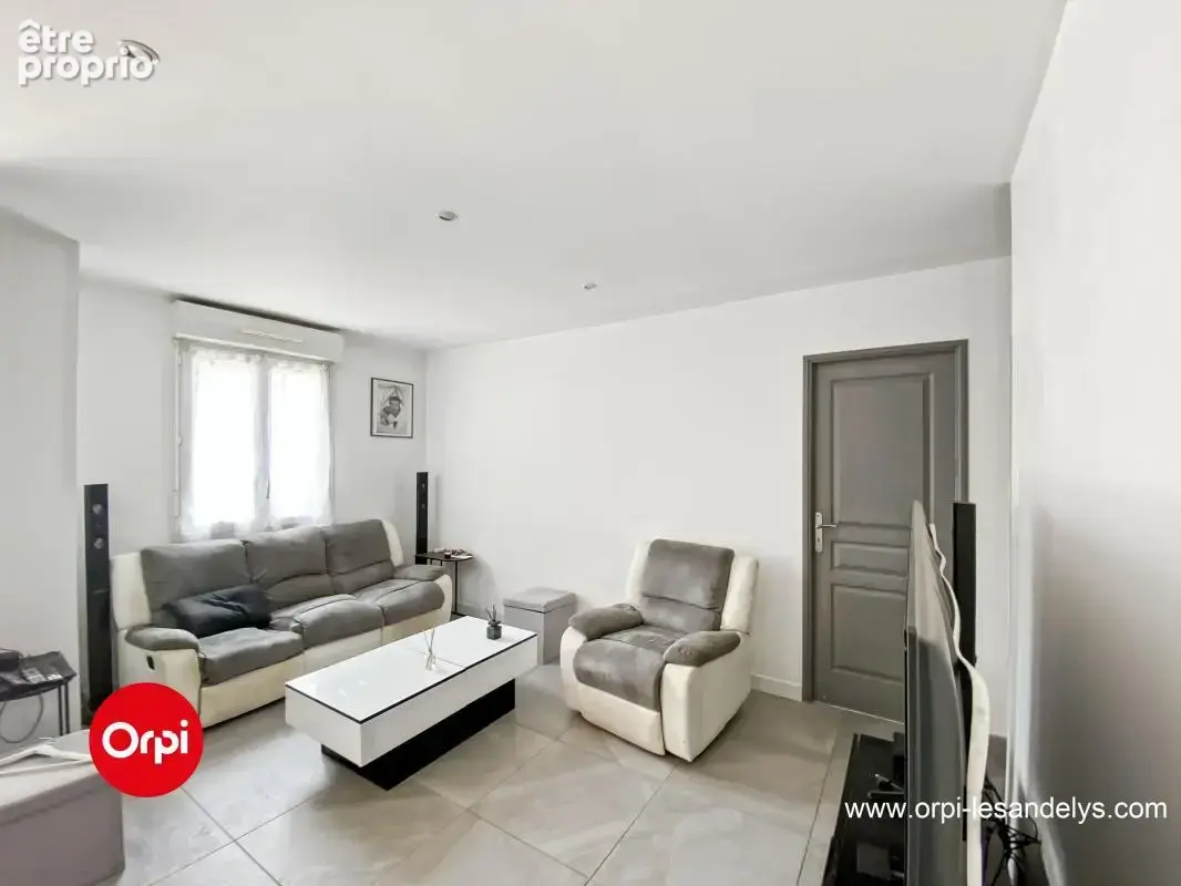 Pavillon RT2012 - séjour (42 m²)  3 chambres  Terrain 812 m² - photo 5