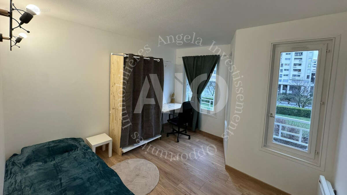 Appartement T3 Bis traversant d'une surface habitable de 68,37 m2 au 2ème étage avec ascenseur avec cave et ga - photo 4