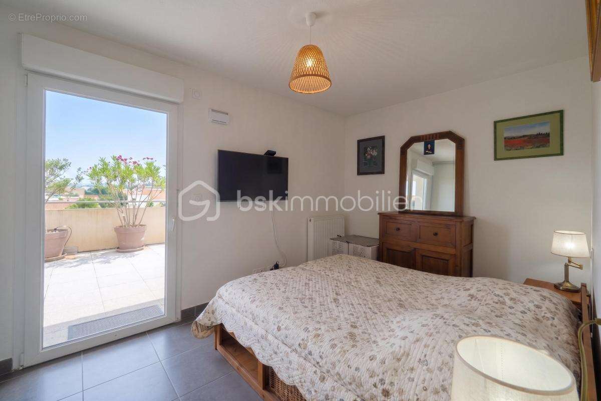 NÎMES CAPOUCHINÉ – Superbe T4 de 96 m² avec Terrasse d'Exception de 57 m² ! - photo 11