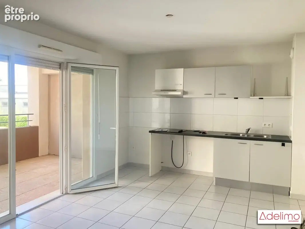 Appartement 3 pièces 57 m² à vendre à Garons (30128) - photo 2