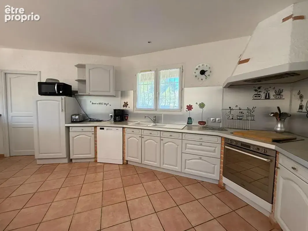 Maison plain-pied Montlegun 190 m² sur vaste terrain arboré avec terrasse et garage indépendant - photo 12