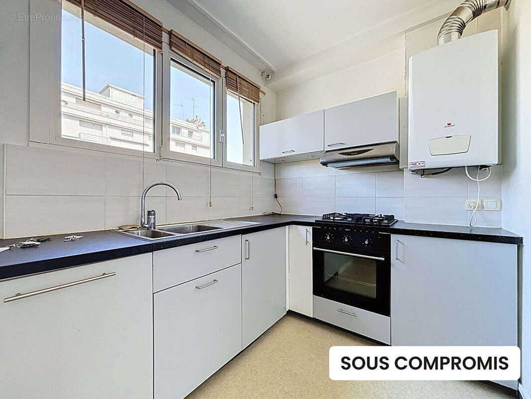 Appartement Rennes - Centre-ville - 4 pièces de 78.4 m² - 2 chambres - 4ème étage - cave - grenier - photo 3