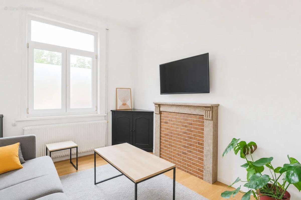 Maison louée 5 pièces 97 m² à Tourcoing - photo 3