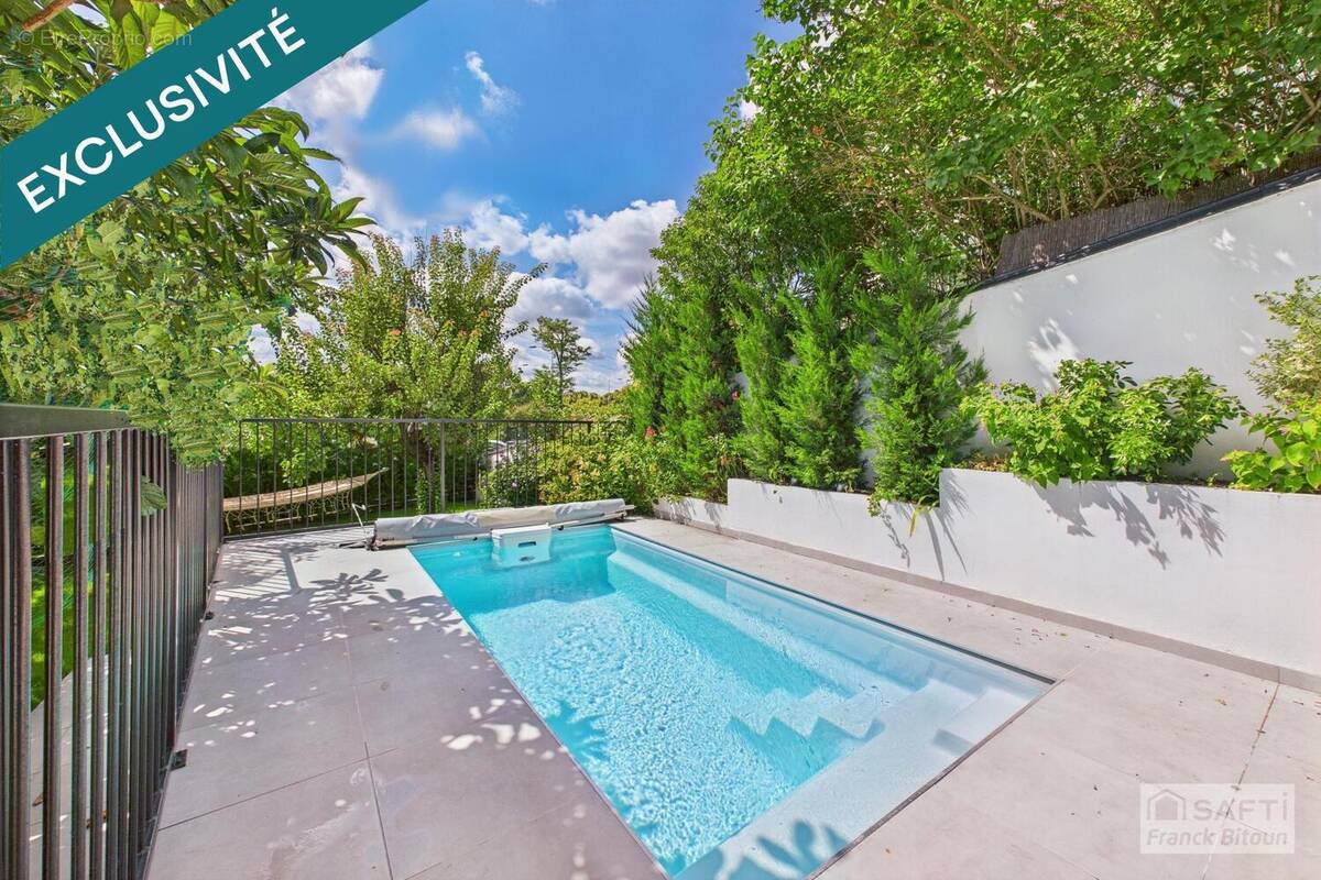 Photo 1 - Maison à COURBEVOIE