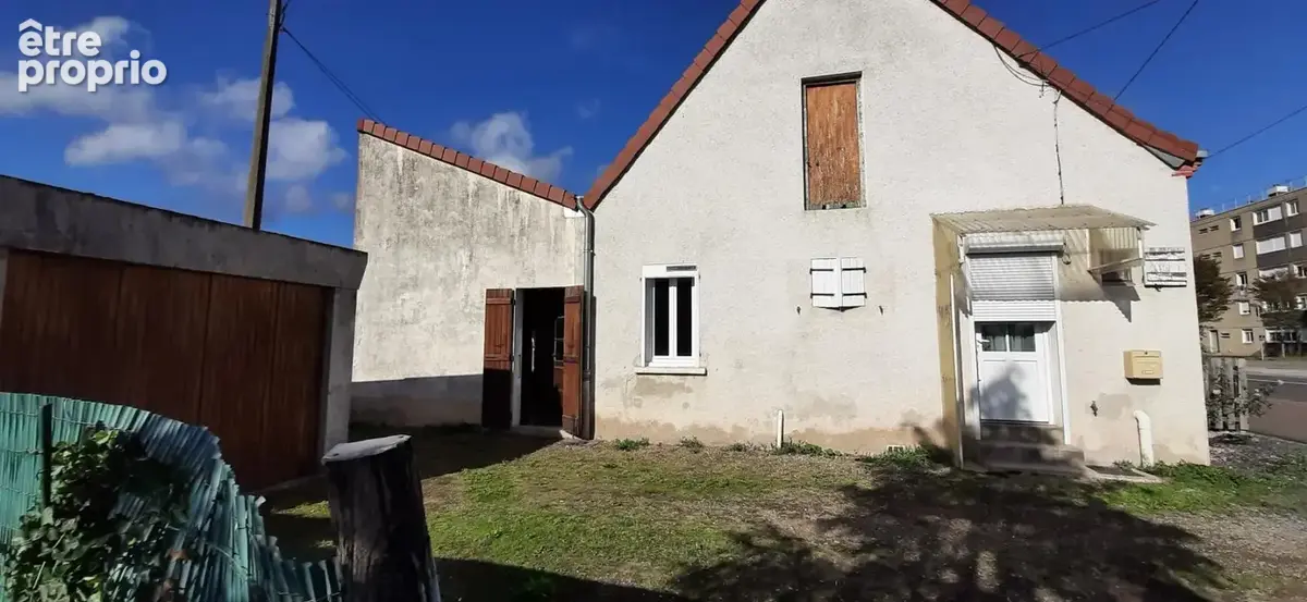 Maison mitoyenne plain pied avec potentiel d'aménagement - photo 11