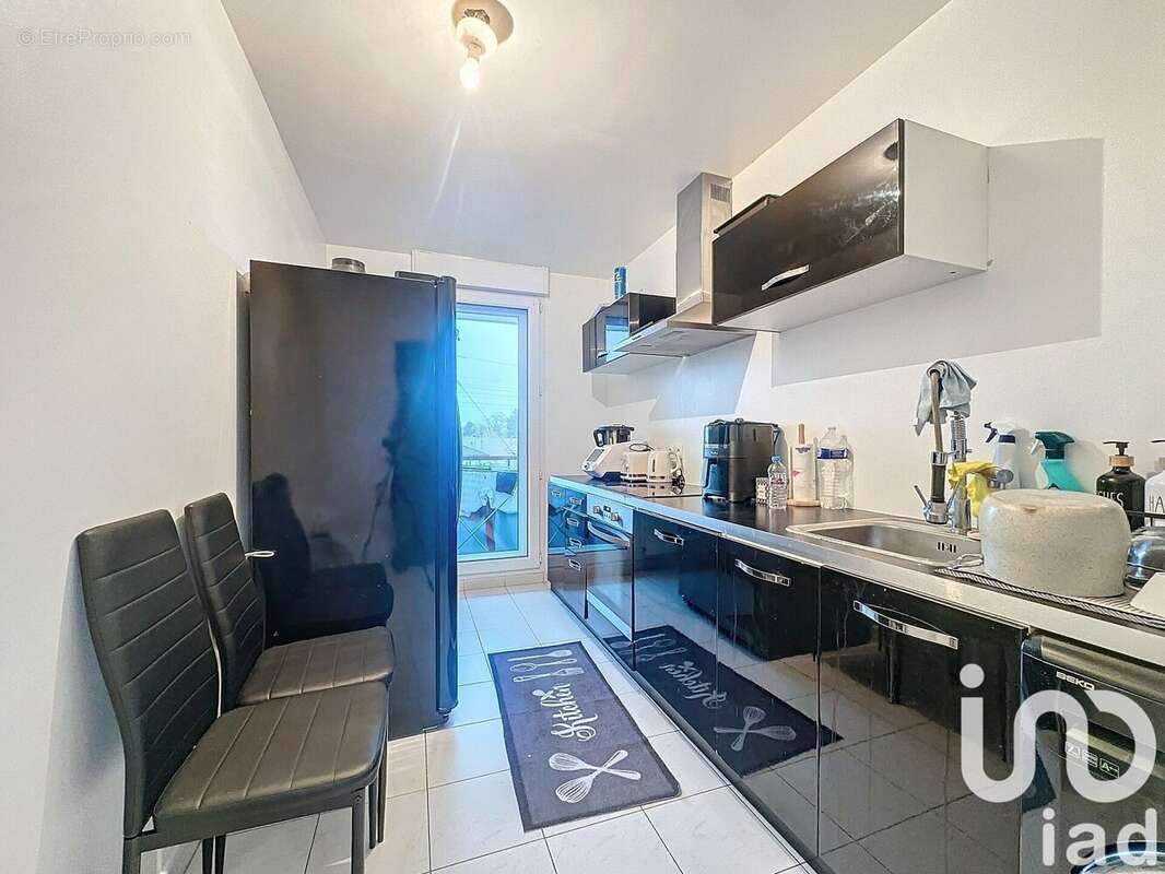 Photo 2 - Appartement à LES MUREAUX