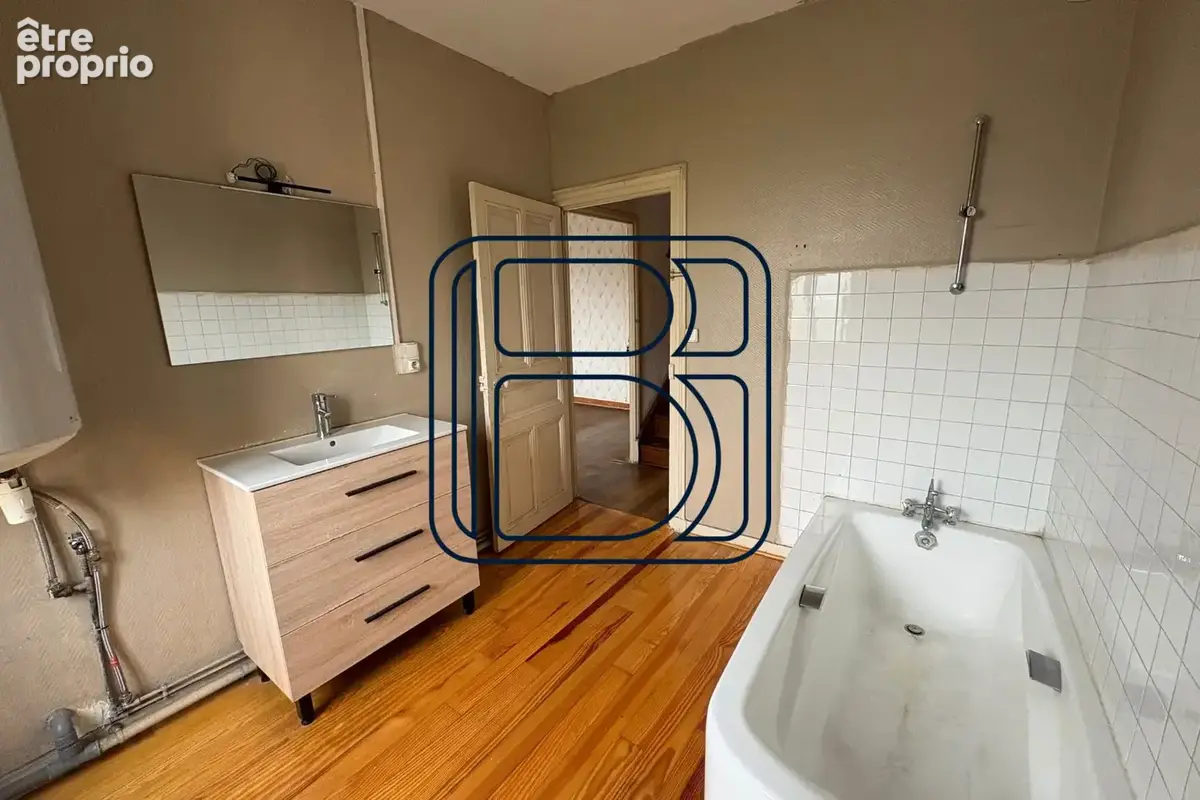 Maison 8 pièces 90 m² à vendre à Ambert (63600) - photo 7