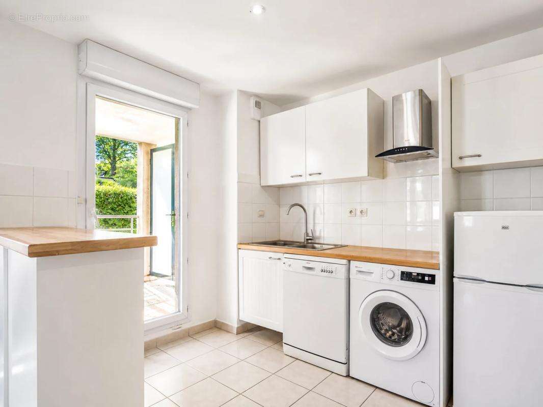 T3 avec terrasse et parking – Investissement locatif sécurisé à - photo 4