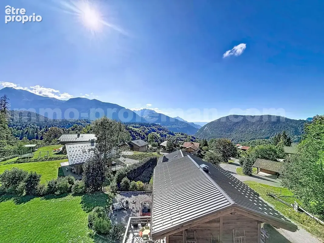 Appartement_T4_Araches_la_frasse_les_carroz_terrasse_balcon_belle_superficie_proche_prox_frontière_Suisse_direction_GENEVE_autoroutes_investissement_locatif_vente_vue_séjour_cuisine_ouverte_calme_nature