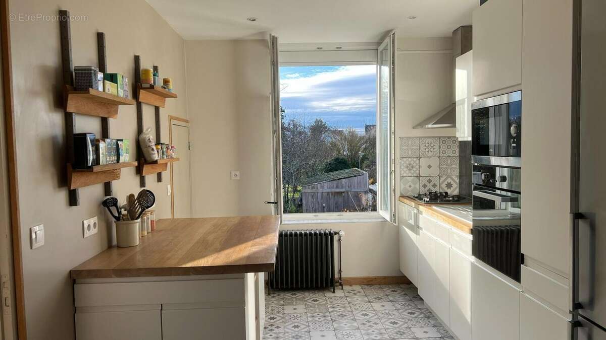 Photo 2 - Maison à FLEURY-LES-AUBRAIS