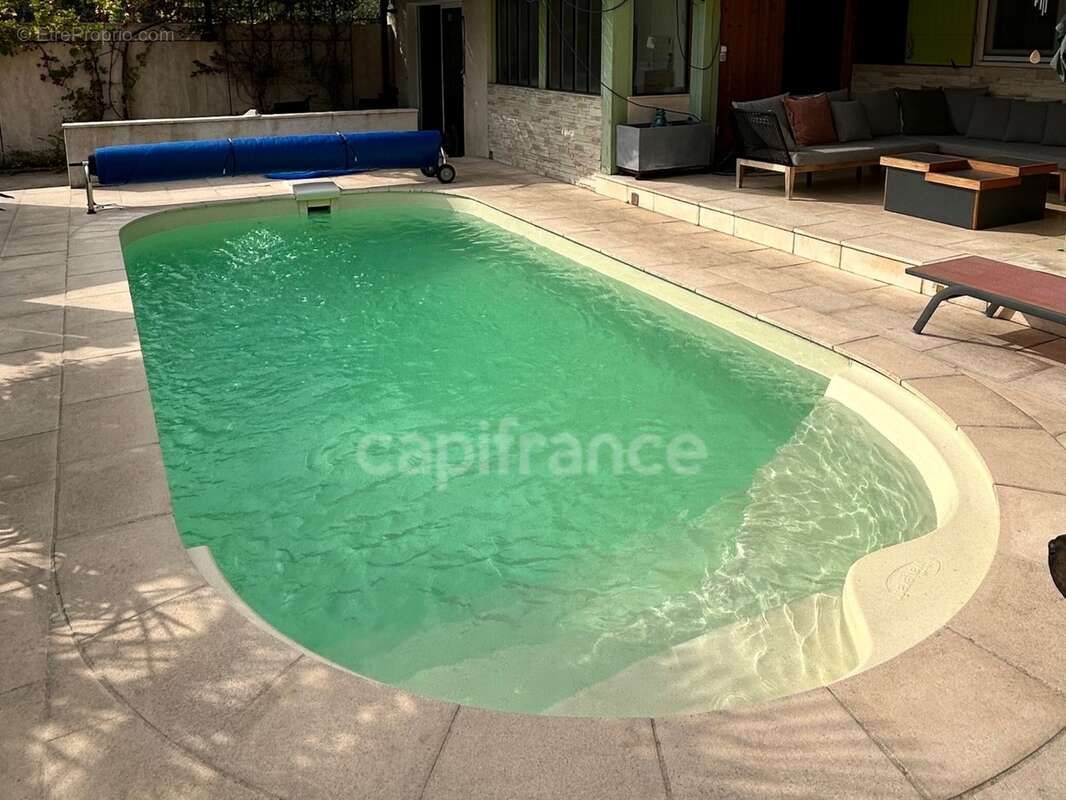 Maison de 116 m² - 4 chambres - proche services à pieds - garage -piscine - photo 29