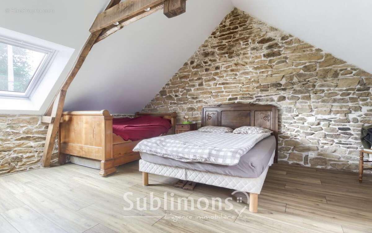 Maison à GRAND-CHAMP