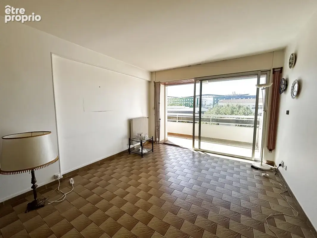 Bel appartement t3 traversant avec terrasse, garage et cave - centre-ville - photo 5