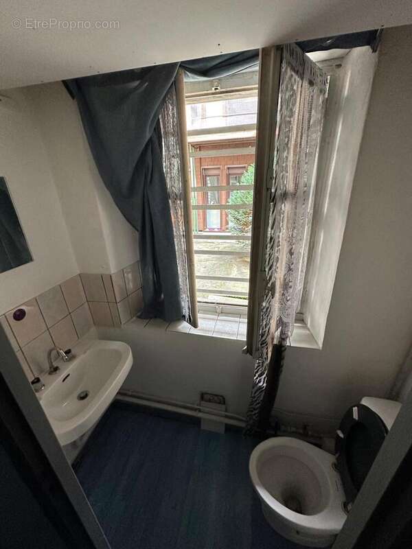 Photo 6 - Commerce à REMIREMONT