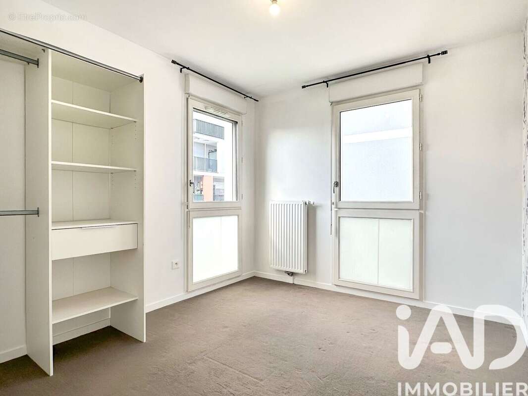 Photo 9 - Appartement à LA COURNEUVE