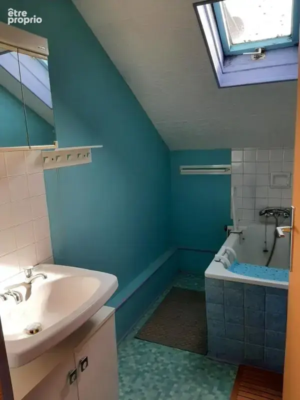 Maison mitoyenne sur 2 niveaux avec potentiel d'agrandissement ou création de logement supplémentair garages et dépendances - photo 14