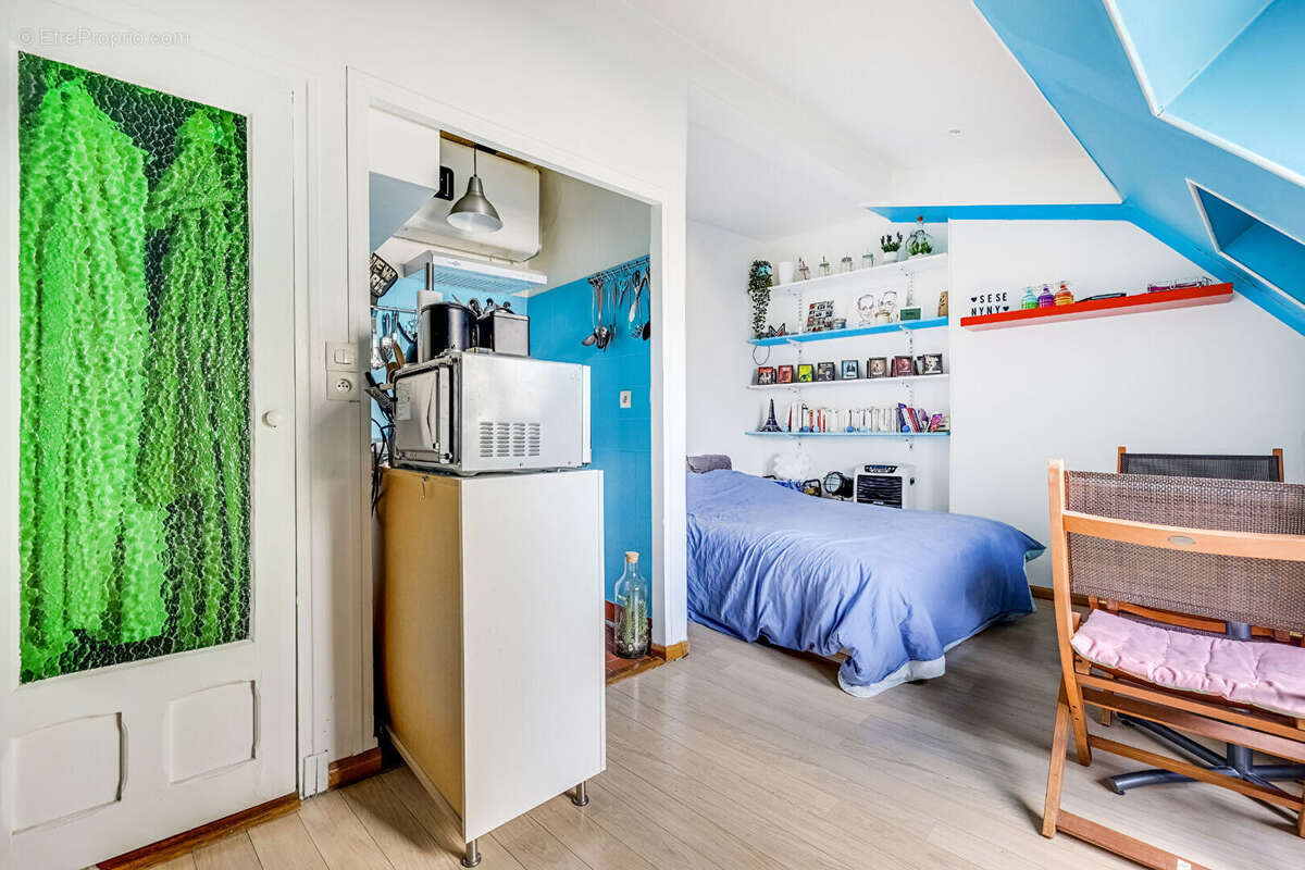 Appartement Paris 1 pièce(s) 16 m2 - photo 9