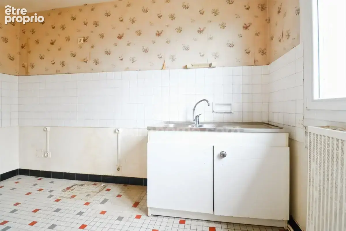 Immeuble de rapport à vendre à CHATEAUPONSAC (Haute-Vienne) - 2 Appartements Type F3 - 4 Garages - photo 10