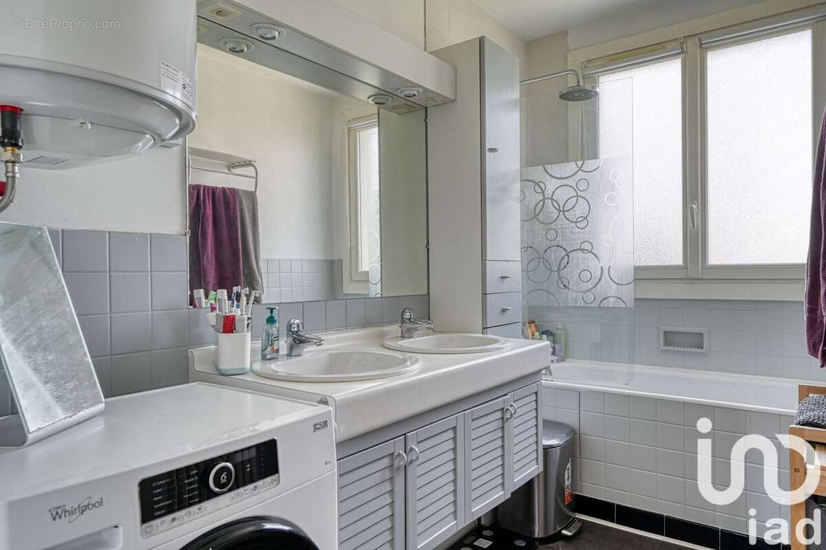 Photo 8 - Appartement à COURBEVOIE