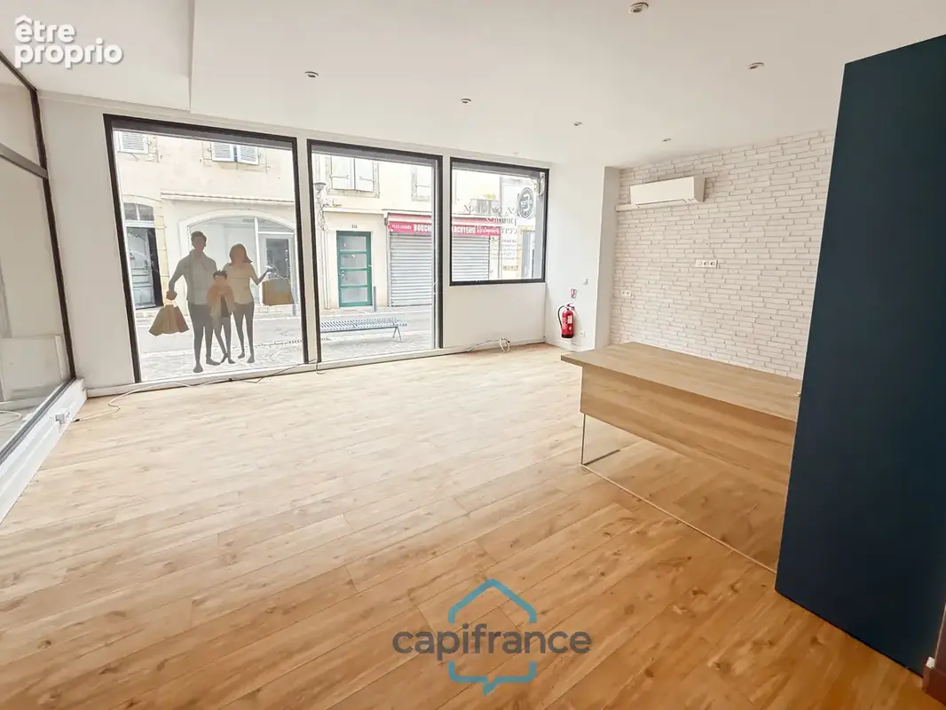 Dpt Landes (40), à vendre AIRE SUR L'ADOUR Local/Bureaux de 72m² utilisables + cave, bon emplacement au centre-ville - photo 2