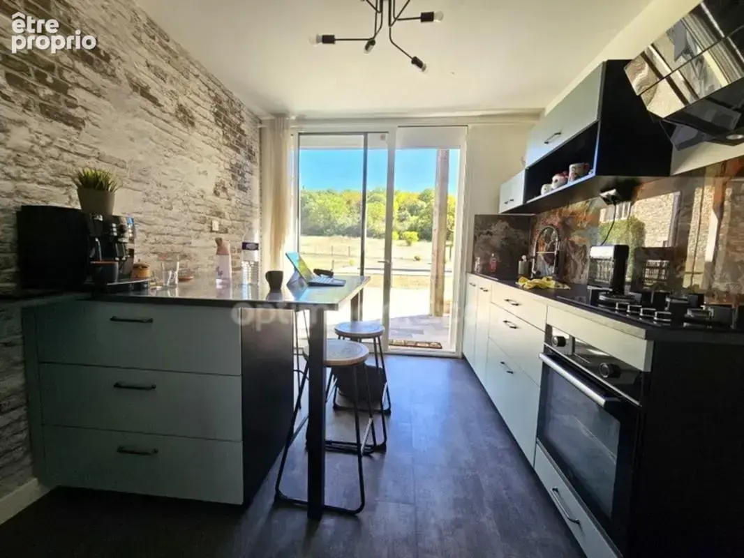 Ensemble immobilier, composé de deux maisons rénovées 135 et 105 m² sur un même terrain de 1900 m² avec piscine Proche de MAGNAC - photo 12