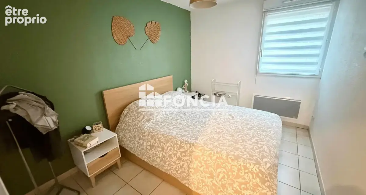 T3 de 61m2 en rez de jardin, avec terrasse et parking vendu libre d'occupation - photo 3