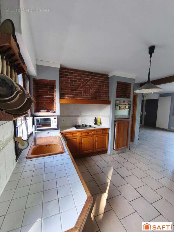 Photo 2 - Maison à RANG-DU-FLIERS