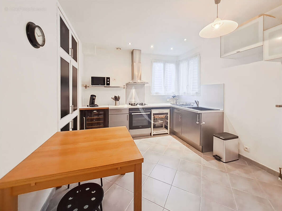 Maison à Saint Germain Lès Arpajon 5 pièces de 112 m2 - photo 4