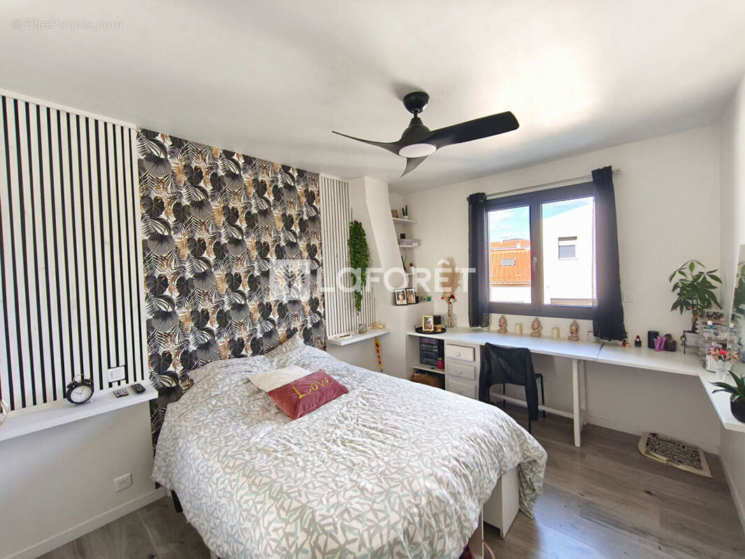 Maison de plus de 100 m², située dans un quartier calme et recherché, à proximité du centre-ville. - photo 6
