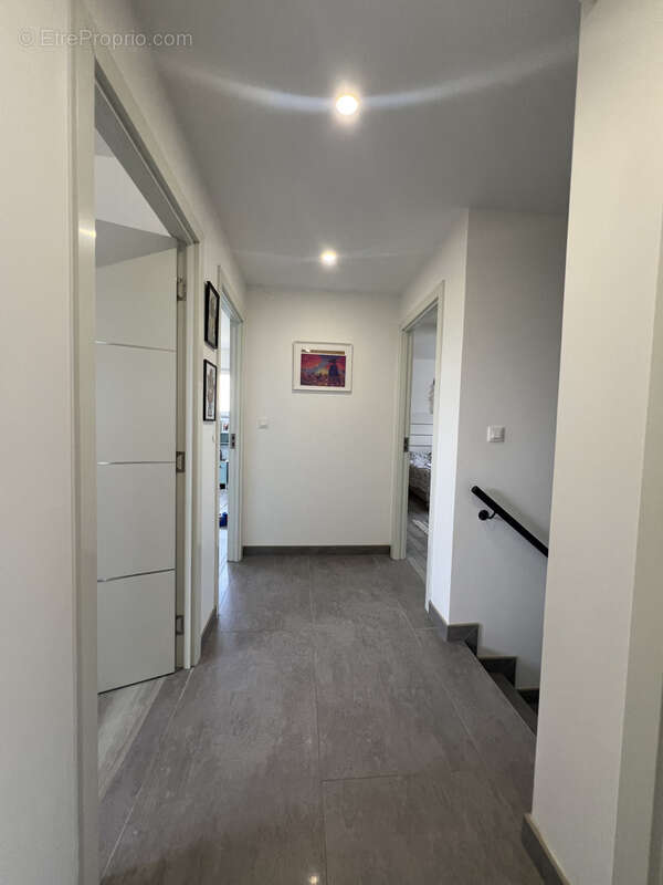 A Bischwihr, une superbe maison individuelle à toit plat 5 pièces de 125 m2 de 2020 de surface habitable sur u - photo 12