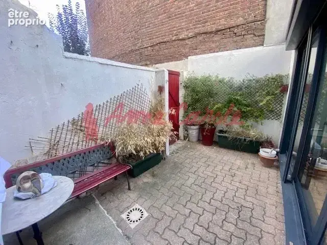 En rez-de-chaussée sur cour privative de 20m2 avec 2 caves - photo 4