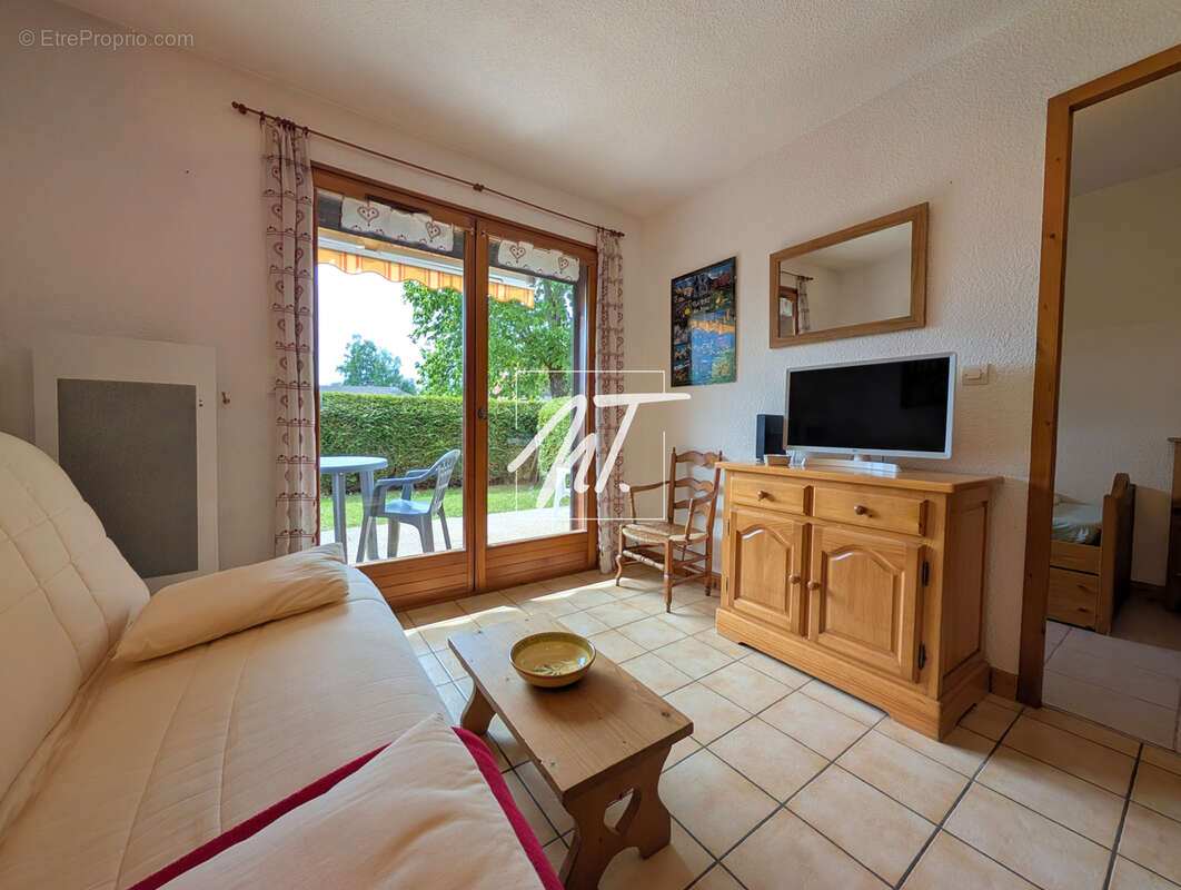 Appartement en rez de jardin à proximité du village - photo 3