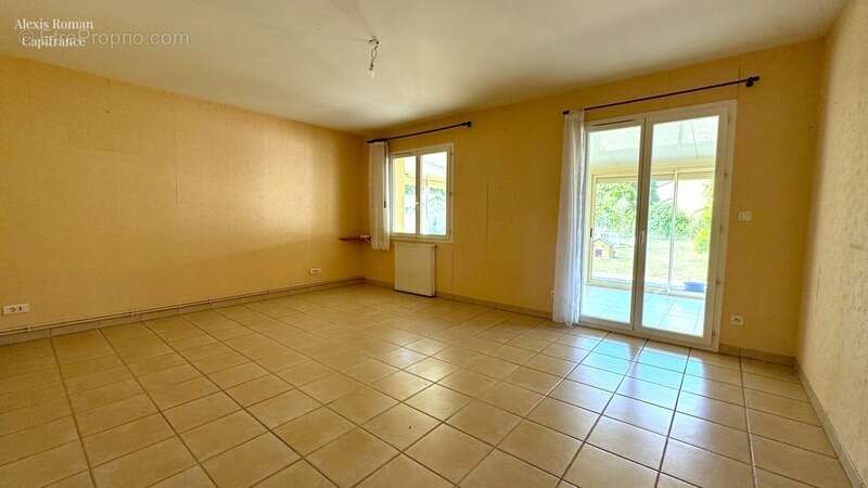 Maison de plain-pied – faible entretien, garage communicant et véranda chauffée - photo 3