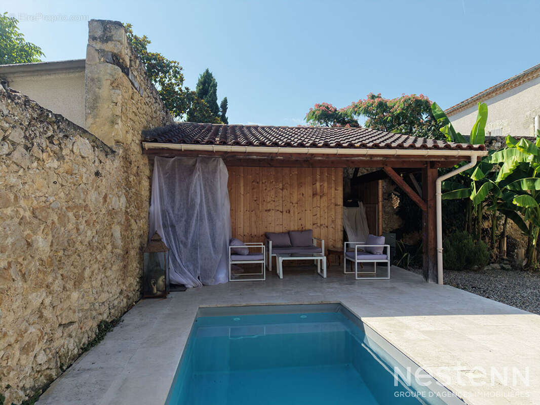 A Vendre Maison de ville en pierre rénovée avec cour intérieure et piscine au centre-ville de Condom - photo 20