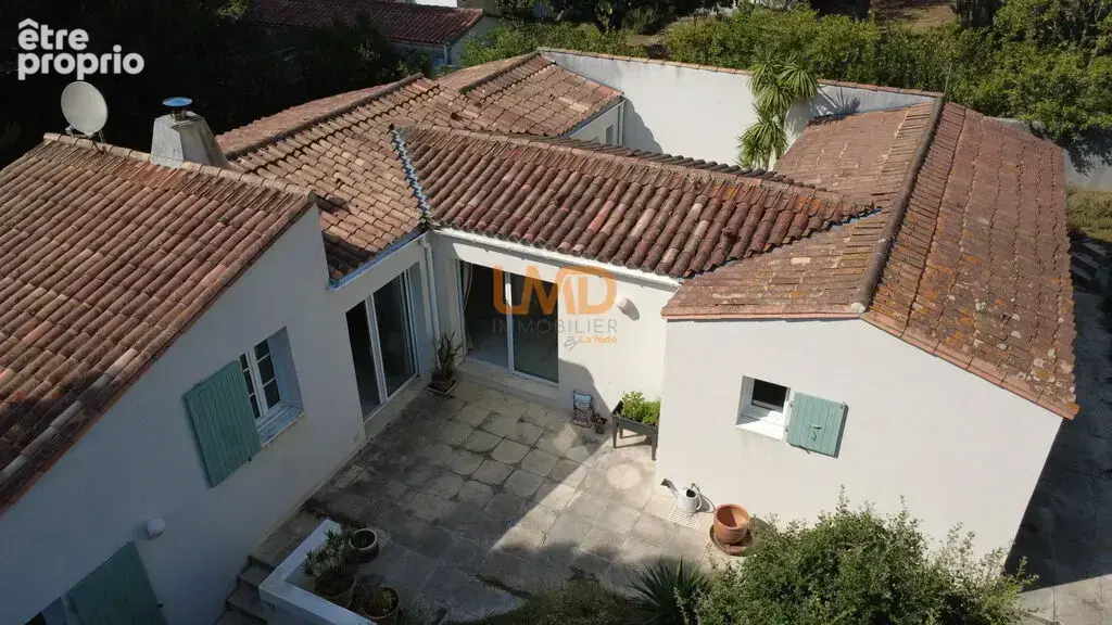 Maison de plain pied proche du centre village - photo 17
