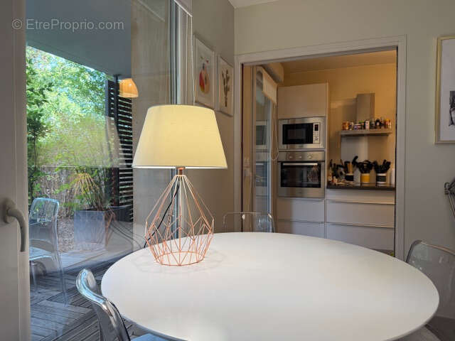 Aux portes de Saint-Cyr-au-Mont-d'Or   T3 de 67 m2 en rez-de-jardin avec terrasse, garage - résidence sécurisé - photo 7