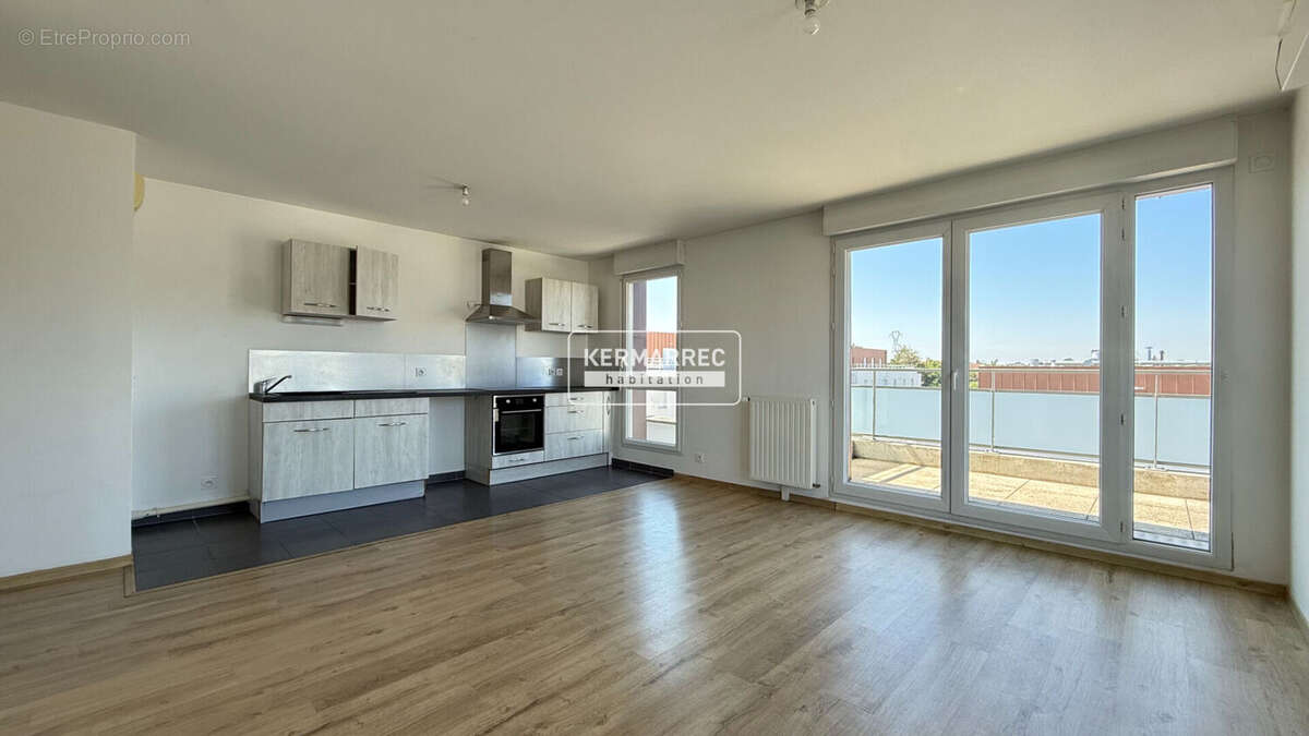 VERTOU BEAUTOUR - Appartement T4 lumineux avec terrasse et 2 parkings en sous-sol - photo 3