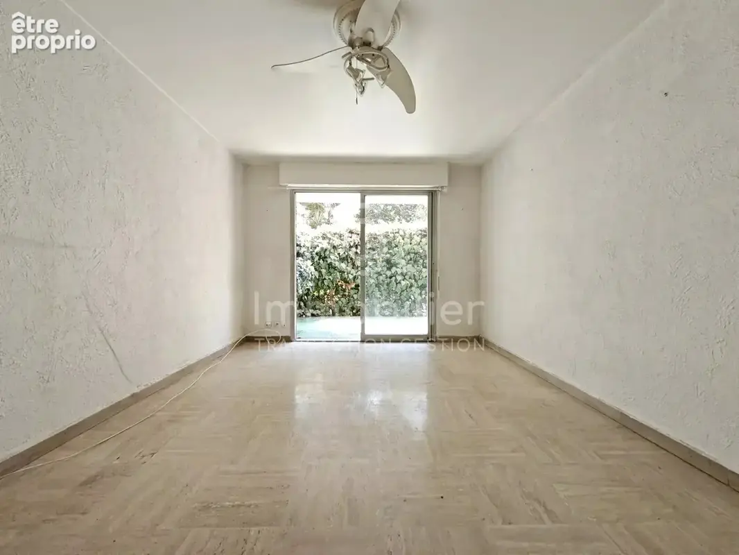 T3 traversant sud-nord 62m² rez-de-jardin - photo 5