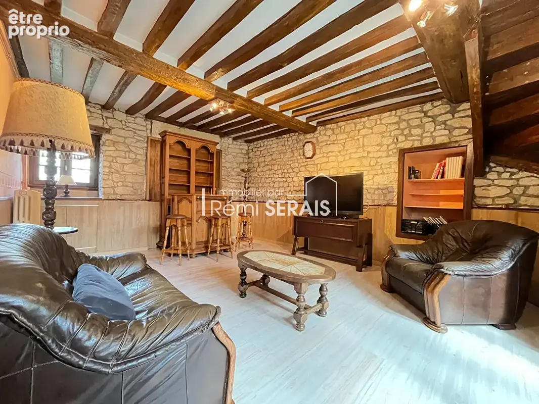 Belle maison familiale avec verger et espaces de vie chaleureux à proximité des commerces - photo 4