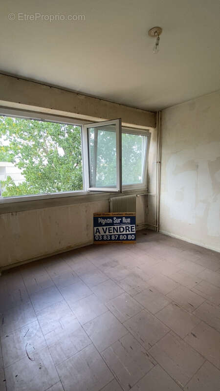 Appartement à rénover de 67 m2 habitables proche centre ville - photo 7
