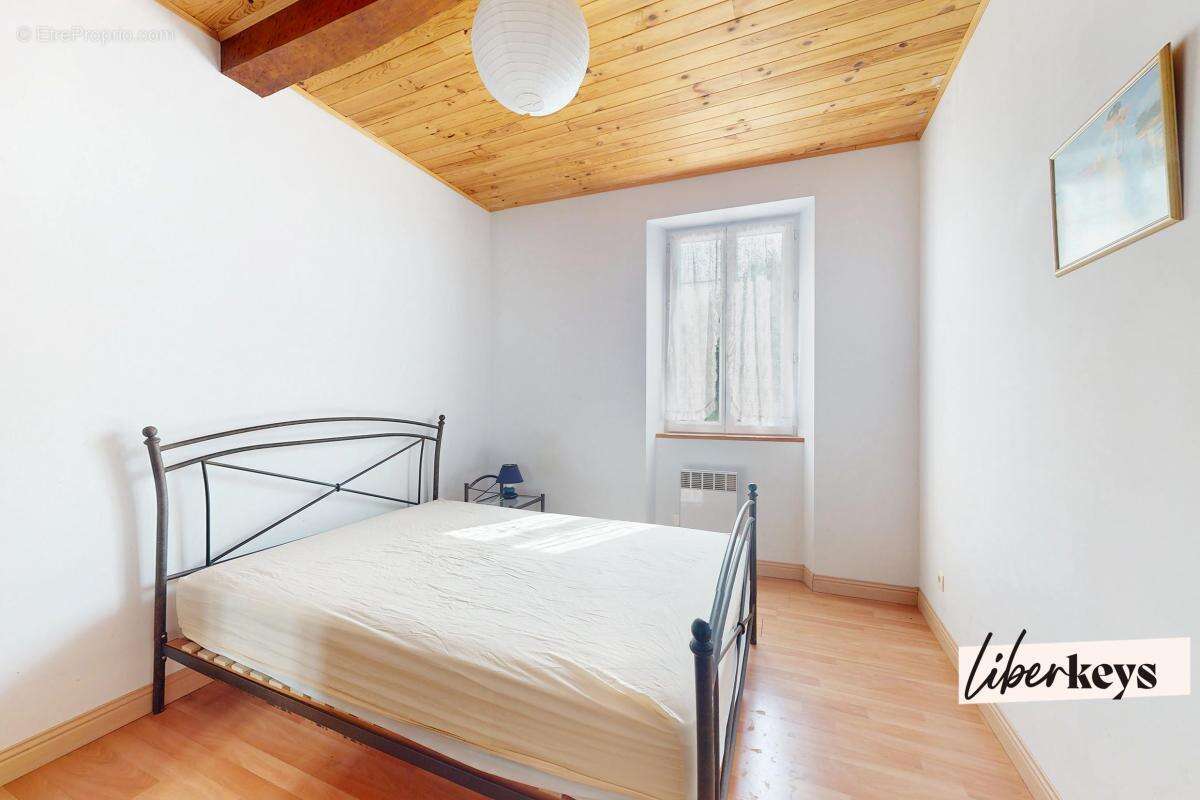Immeuble comprenant deux habitations et un commerce - photo 3