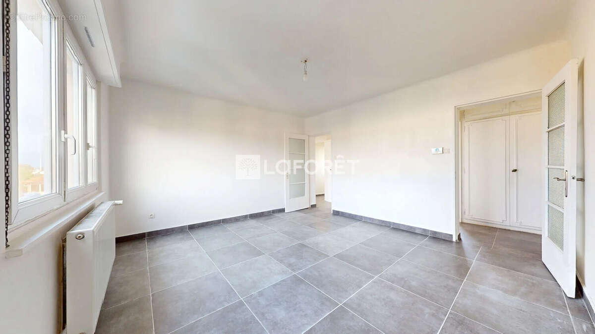 Appartement 3 pièces 68,10 m² Terrasse  Parking Cave & Grenier - photo 7